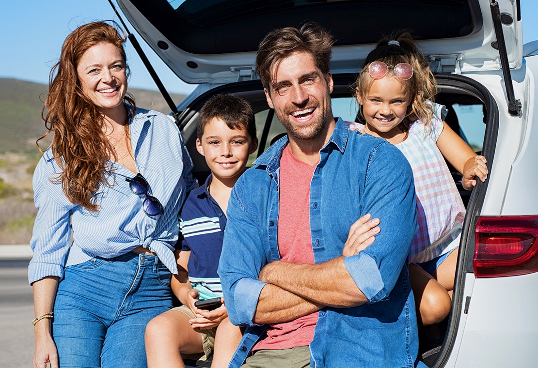 Photo of a family on a road trip