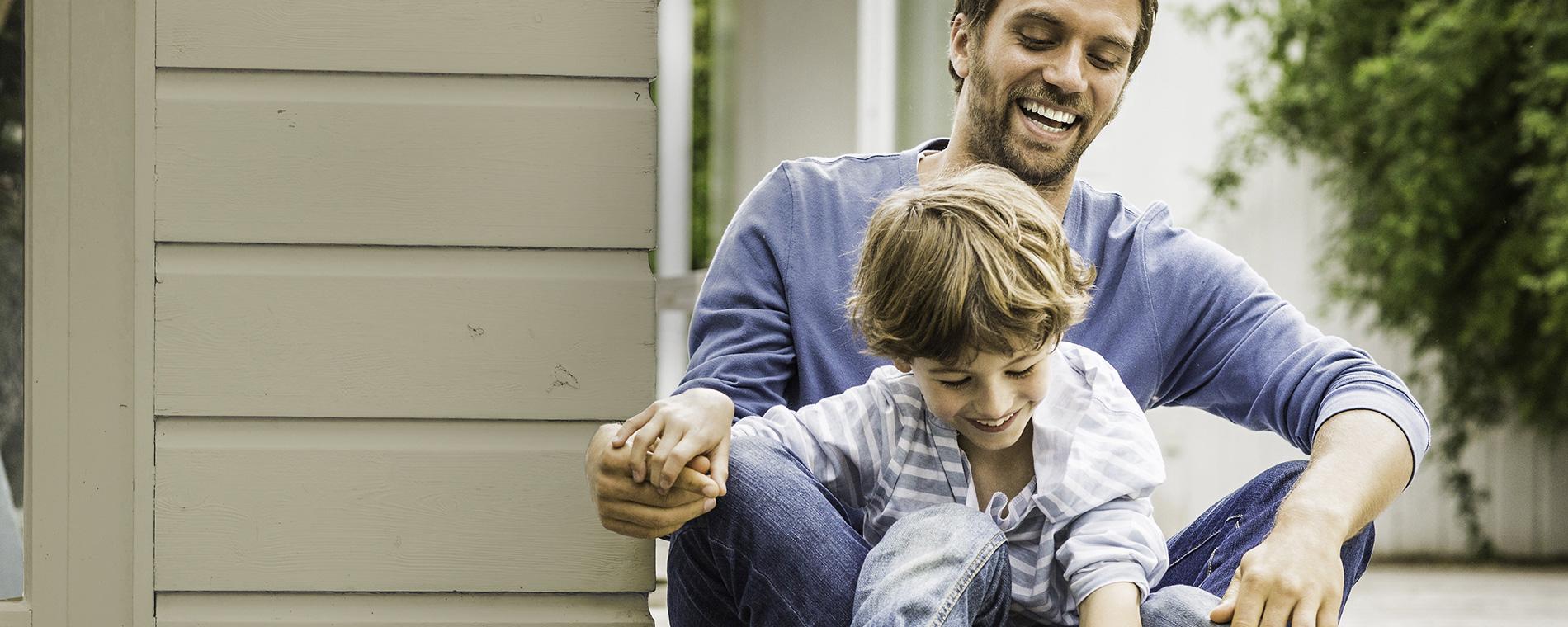 Father and son enjoying homeowners protection