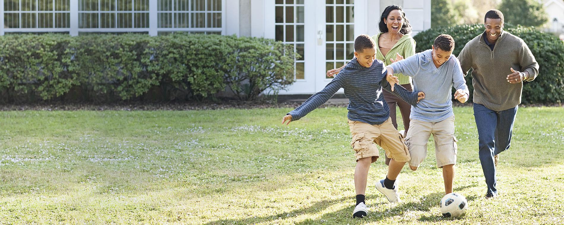 Family with the house and other assets protected by a PEL policy in case of a sports injury claim or lawsuit.